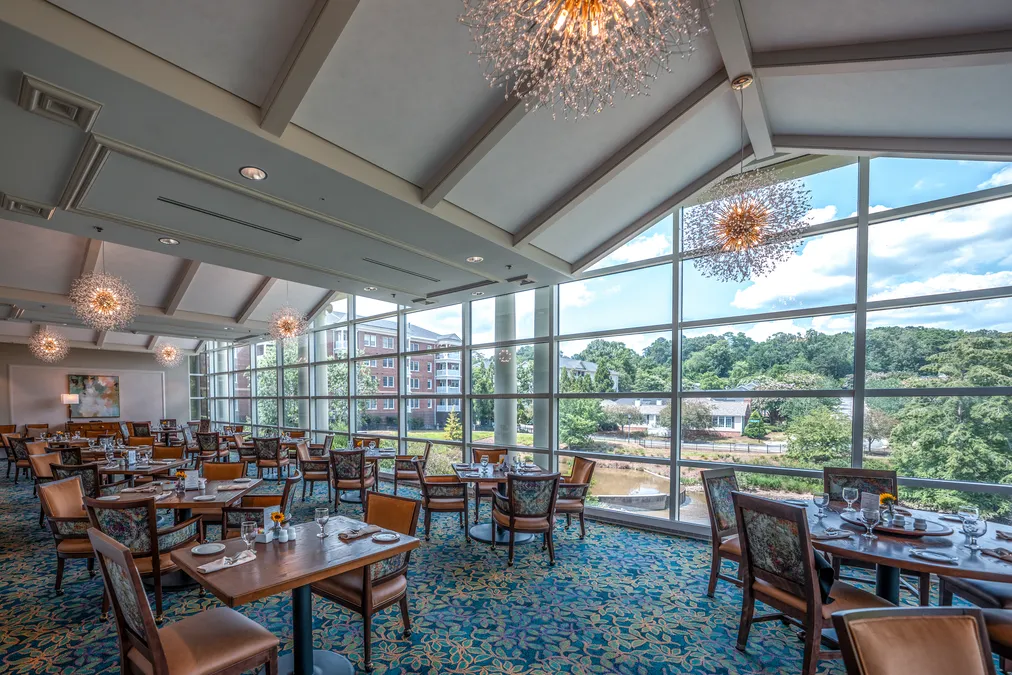 The Cedars clubhouse renovation featuring new dining and community spaces.